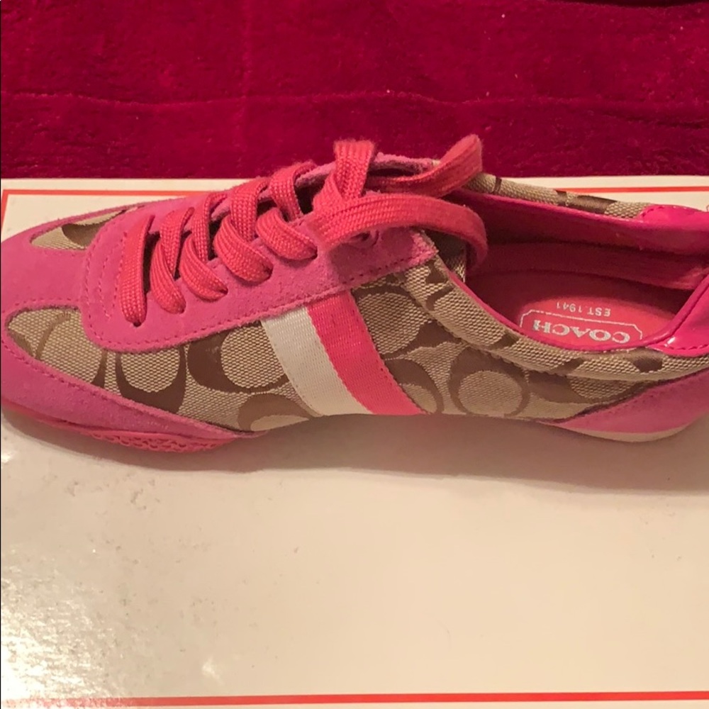 Pink Coach shoes.